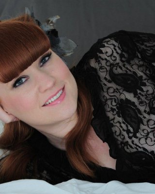 Lucy Ohara rides her toy wearing only her black lace garter belt and nylons #59121110
