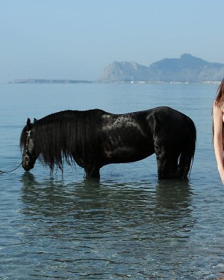 Emily Bloom Enjoys Some Nude Horse Back Riding On The Beach