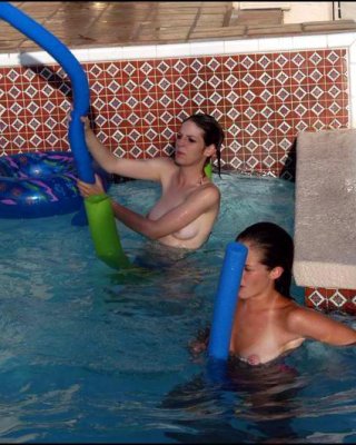 Lesbians Teens Play In A Pool