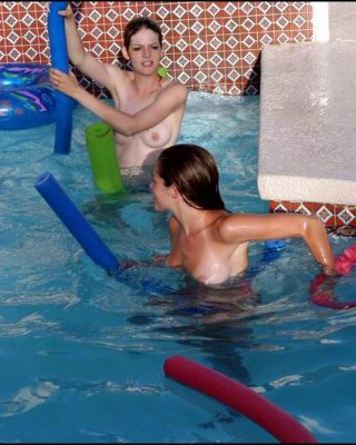 Lesbians Teens Play In A Pool