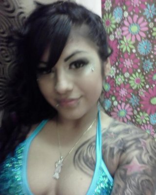 Compilation Of A Sexy Tattooed Chick Posing On Cam