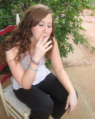 Sexy Red Head Teen Ruby Takes A Smoke Break And Flashes The Camera