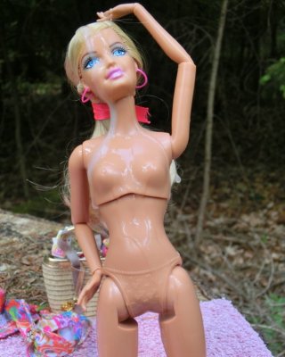 11 Barbie Sunbathing (Doll)