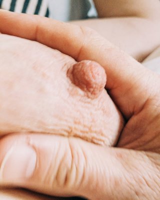 playing with wife&#039;s big nipple #106504982