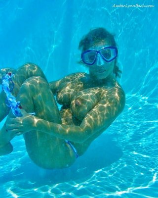 Enjoying Her Underwater Tits