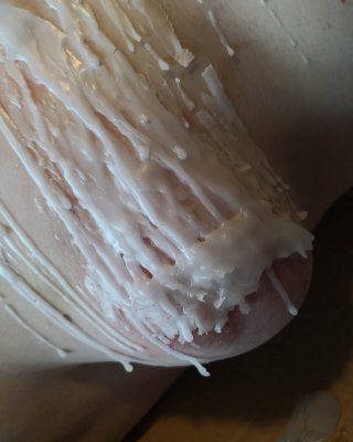 Breasts In Hot Wax