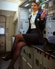 Sexy Stewardess In Heels And Stockings