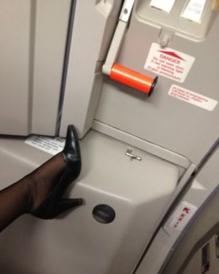 Sexy Stewardess In Heels And Stockings