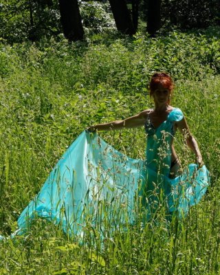 With a turquoise veil in the contrlight #107047402
