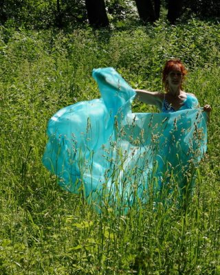 With a turquoise veil in the contrlight #107047439